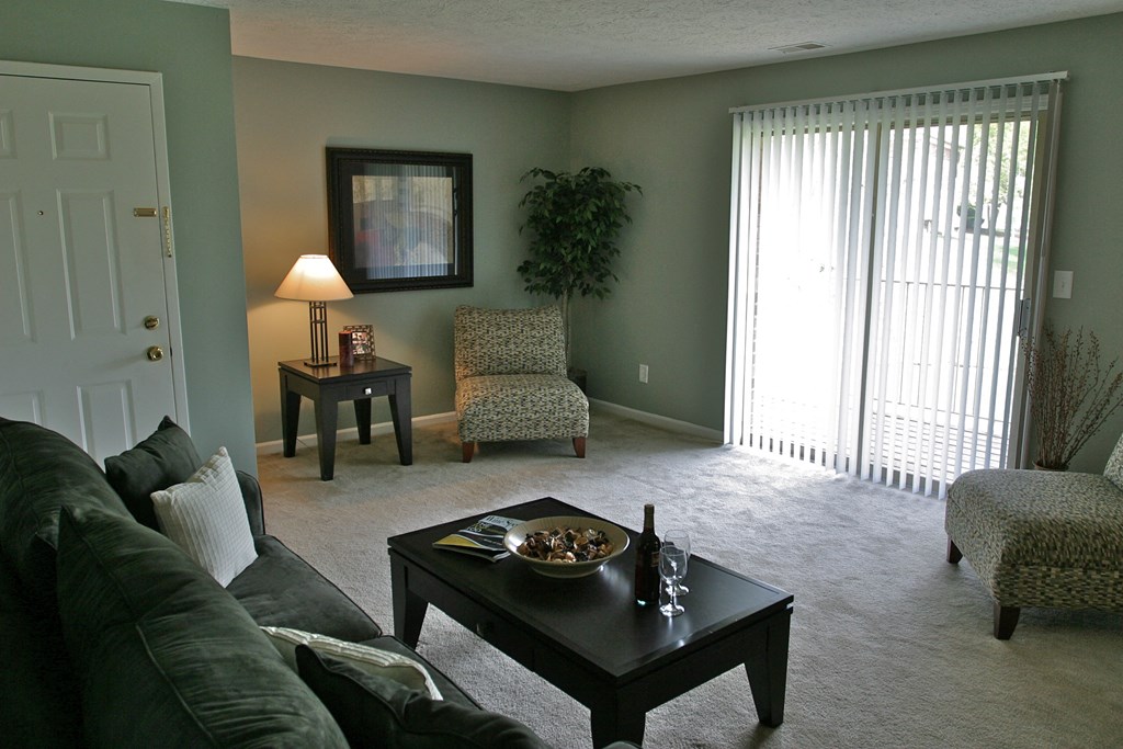 a living room with a couch and a table