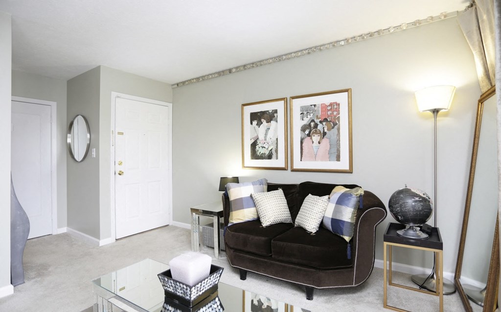 a living room with a couch and a table