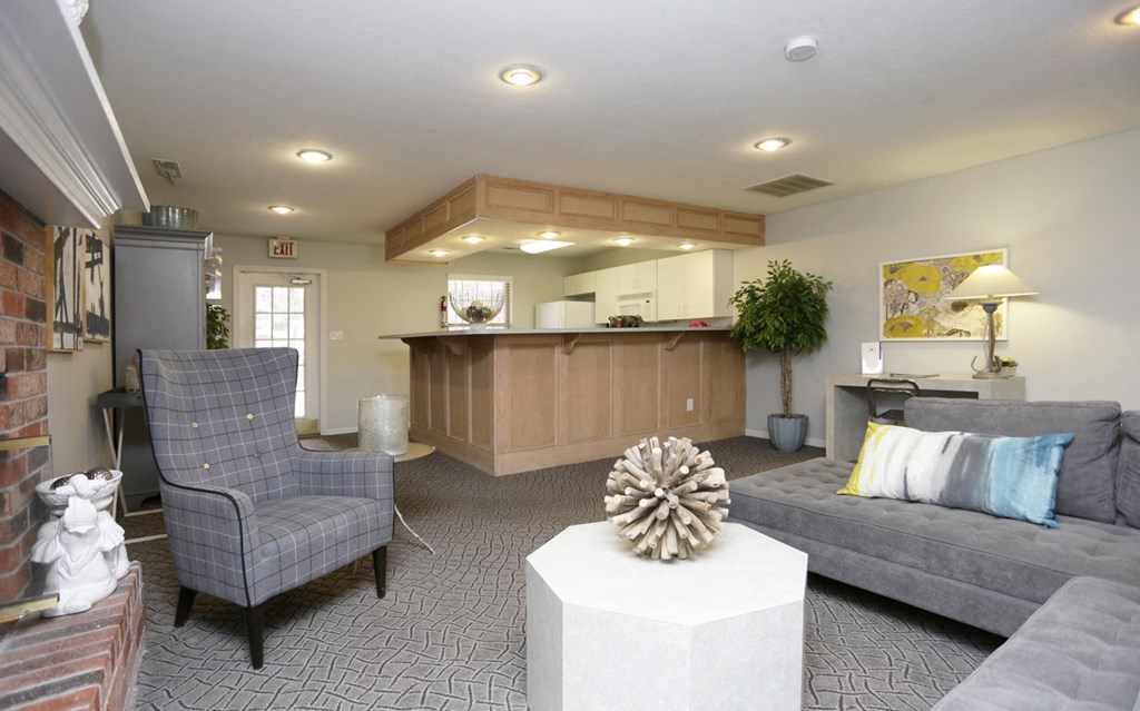 a living room with a couch and a table