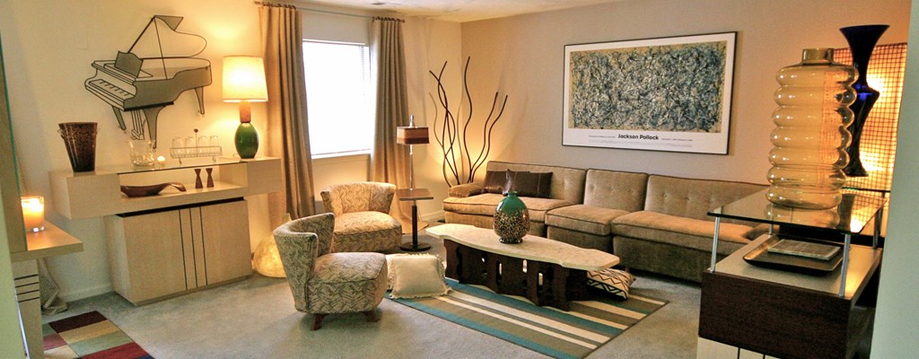 a living room with a couch and a table