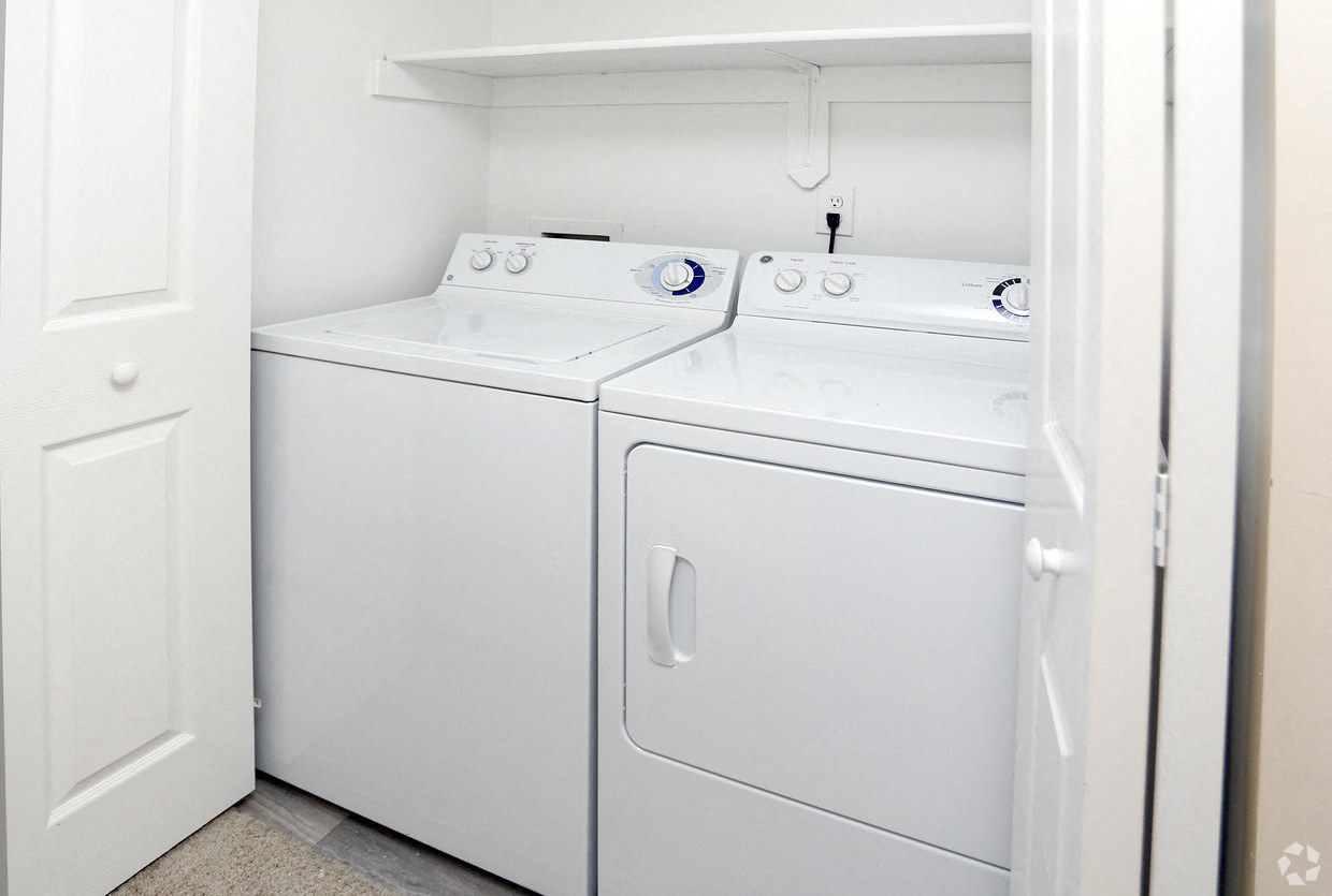 a washer and dryer in the laundry room of a home