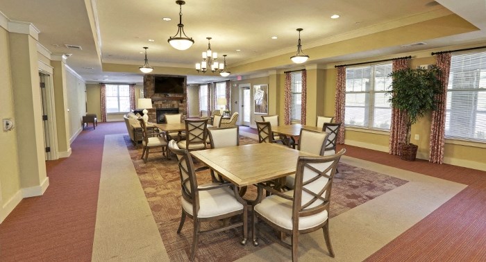 decatur affordable family apartment a large dining room with a table and chairs