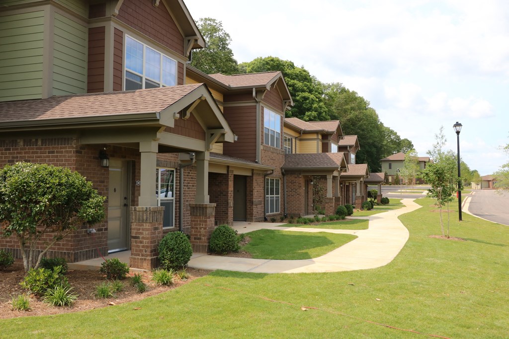 decatur affordable family apartment  a row of homes on a sidewalk