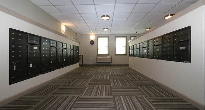 a view of the ceiling of a building with lights on it