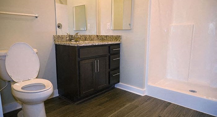 a bathroom with a toilet and a sink