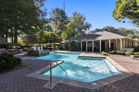A pool with a ladder in the middle of it.
