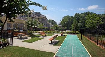 brookhaven senior living affordable a park with benches and a ping pong table