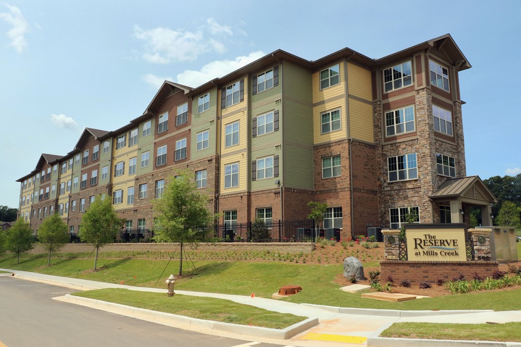 affordable senior luxury decatur an apartment building on the corner of a street