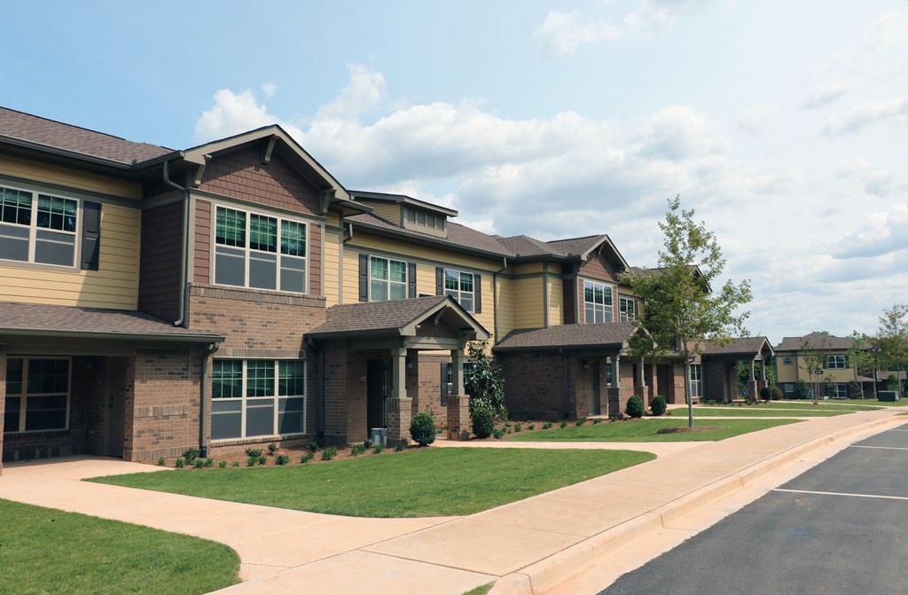 decatur affordable family apartment a row of houses on the side of a street
