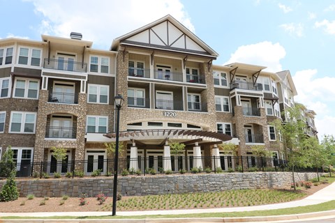 decatur affordable family apartment an image of a large apartment building with a stone wall