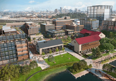 an aerial view of the university of memphis campus with the downtown memphis skyline in the