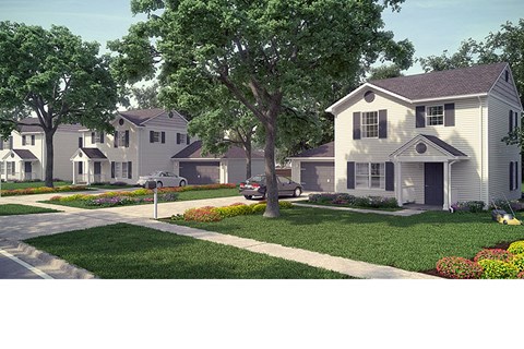 A row of houses with a tree in front of the first house.