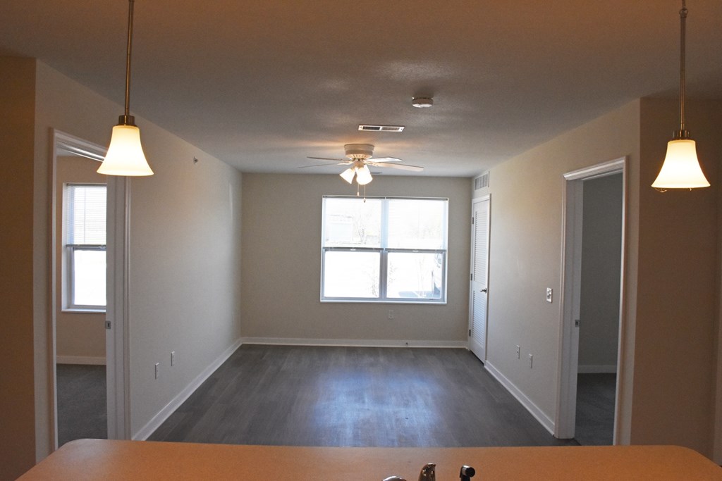 A room with a table and chairs in it.