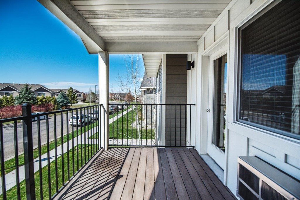 the view of the yard from the balcony of a home at Madison Park, Bozeman, 59718