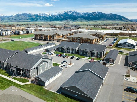 a city with mountains in the background at Madison Park, Bozeman, 59718