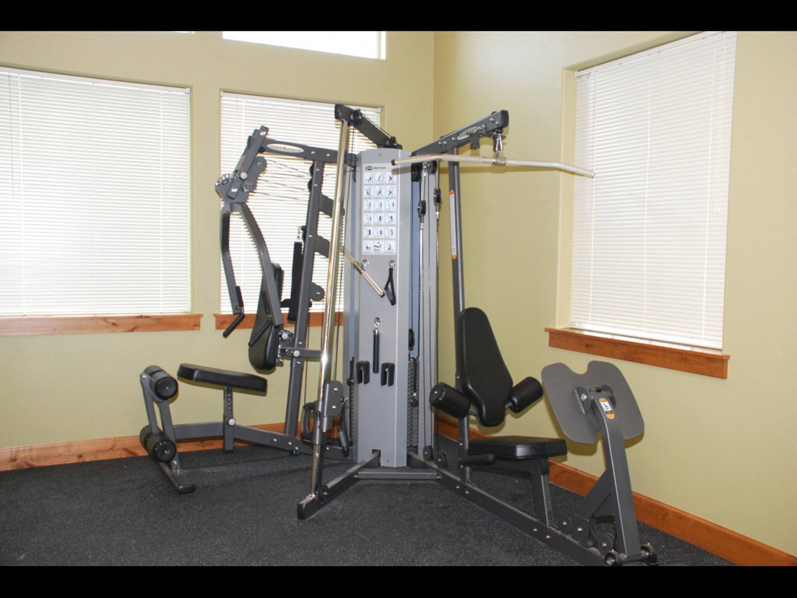 the gym has a lot of exercise equipment  at Quail Springs, West Richland, 99353