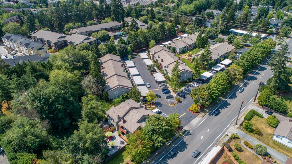 an aerial view of a neighborhood with houses and trees at Quartz Creek, Mountlake Terrace
