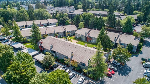 a view from the sky of a group of buildings and trees at Quartz Creek, Washington, 98043