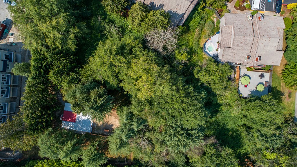 a birds eye view of a house with trees and a pool at Quartz Creek, Mountlake Terrace, WA, 98043
