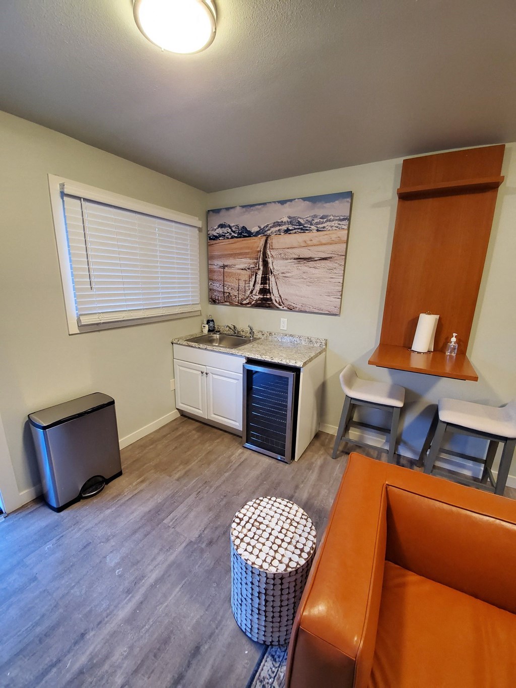 a small kitchen with a counter top and a sink at Rock Creek, Billings