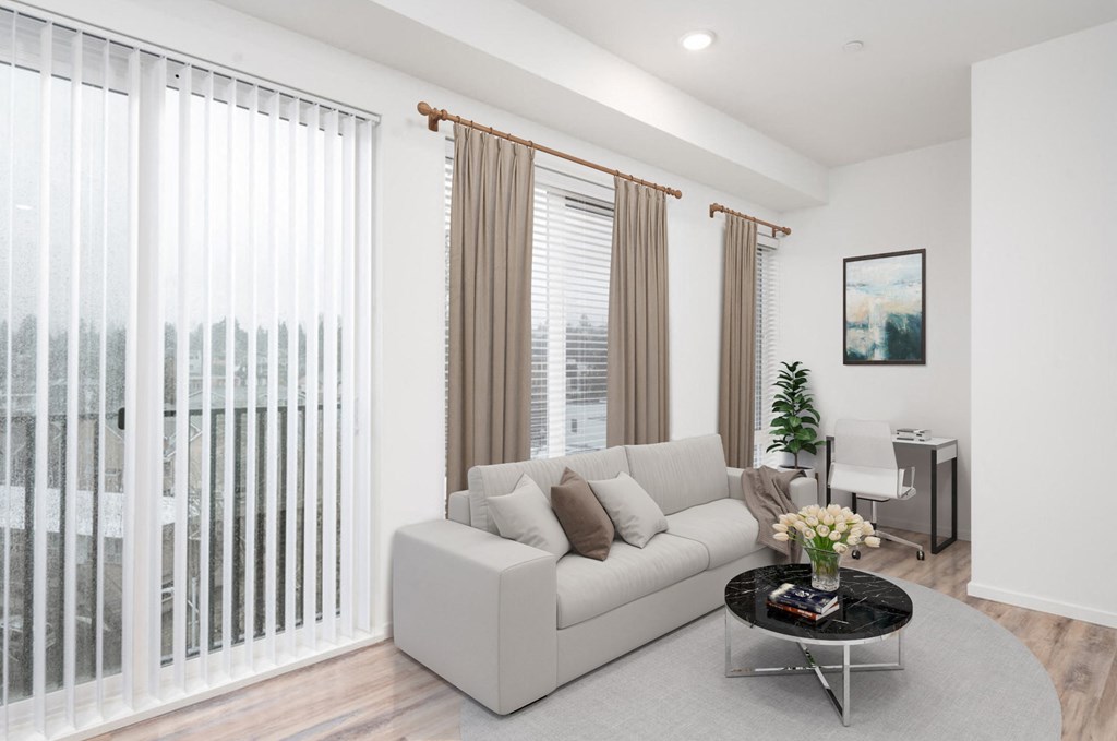 a living room with a couch and a table at The Loop at Green Lake, Washington, 98115