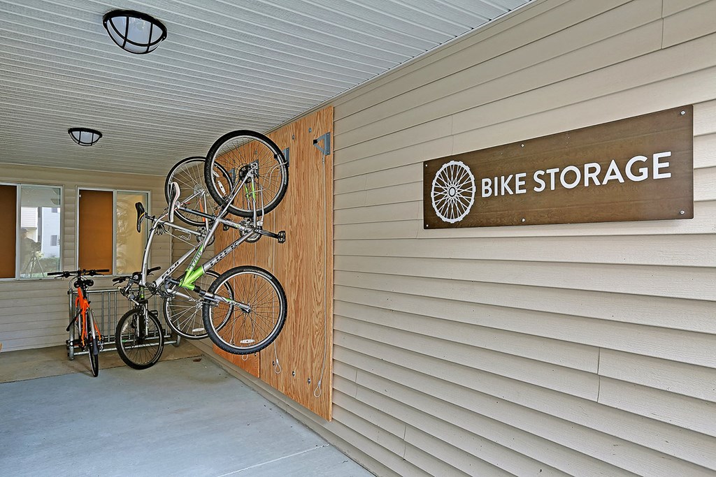 the bike storage area of the bike store with bikes on the wall  at Townside Flats, Washington, 98052
