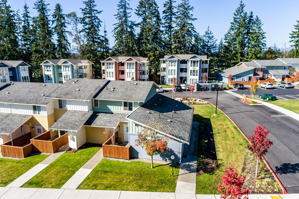 an aerial view of a row of houses on a street at Woodcreek, Poulsbo Washington