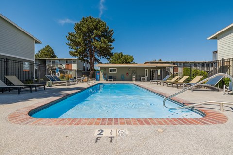 A small pool with a 2 ft depth marker in the middle.