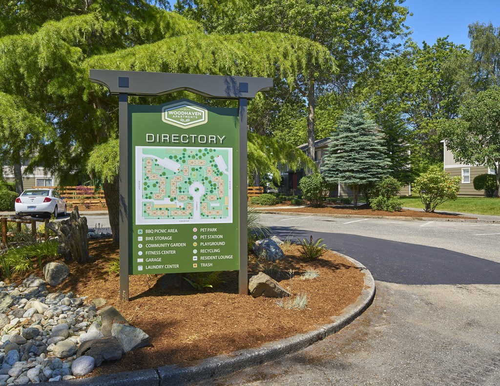 a sign that reads directory in front of a parking lot  at Woodhaven, Everett, WA