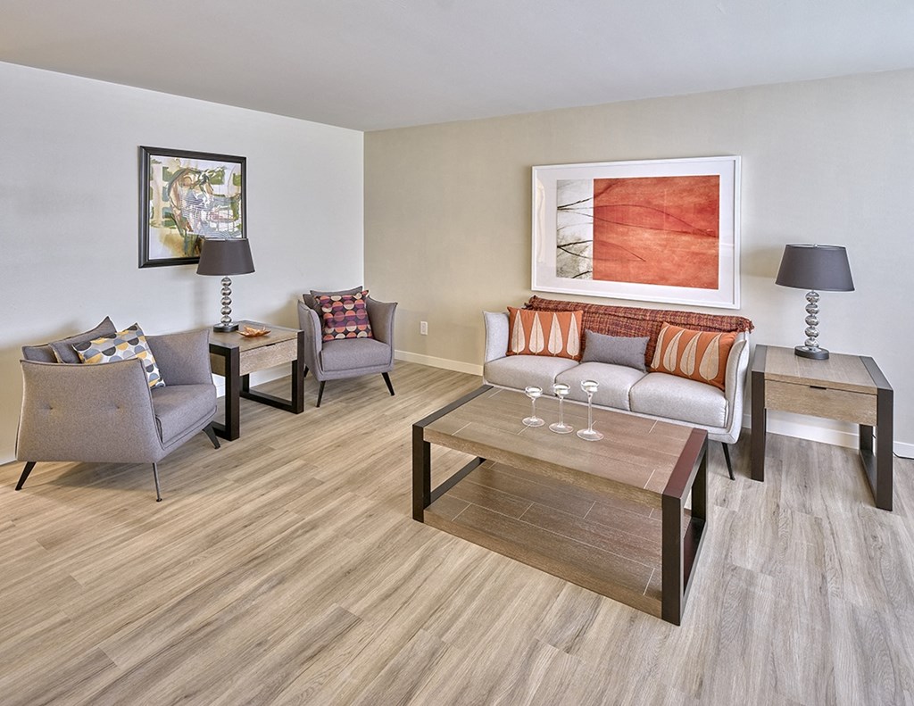 a living room with a couch chairs and coffee table  at 3030 Lake City, Seattle, Washington