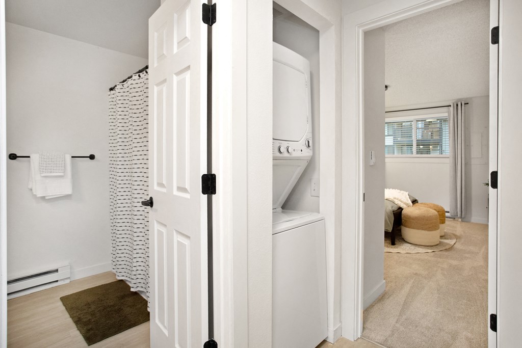 an open closet with a washer and dryer in a home at Brix, Walla Walla