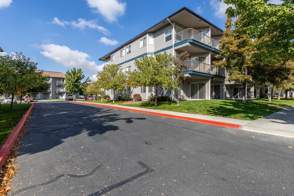 our apartments are located in a quiet neighborhood with trees  at Shoreline Village, Washington