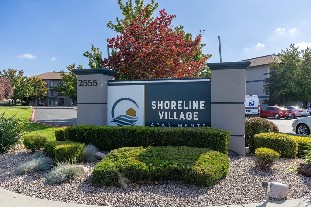 a sign for shortline village in front of a parking lot  at Shoreline Village, Richland, 99352