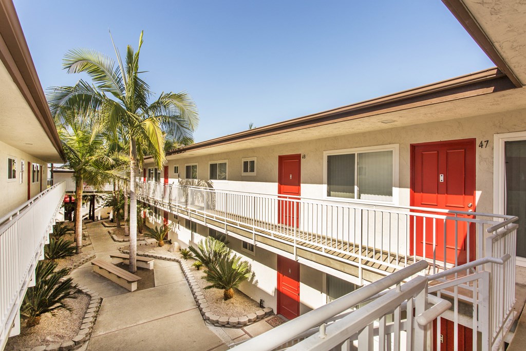Pacific Sands walkway with tropical landscaping at Pacific Sands, San Diego, CA, 92117