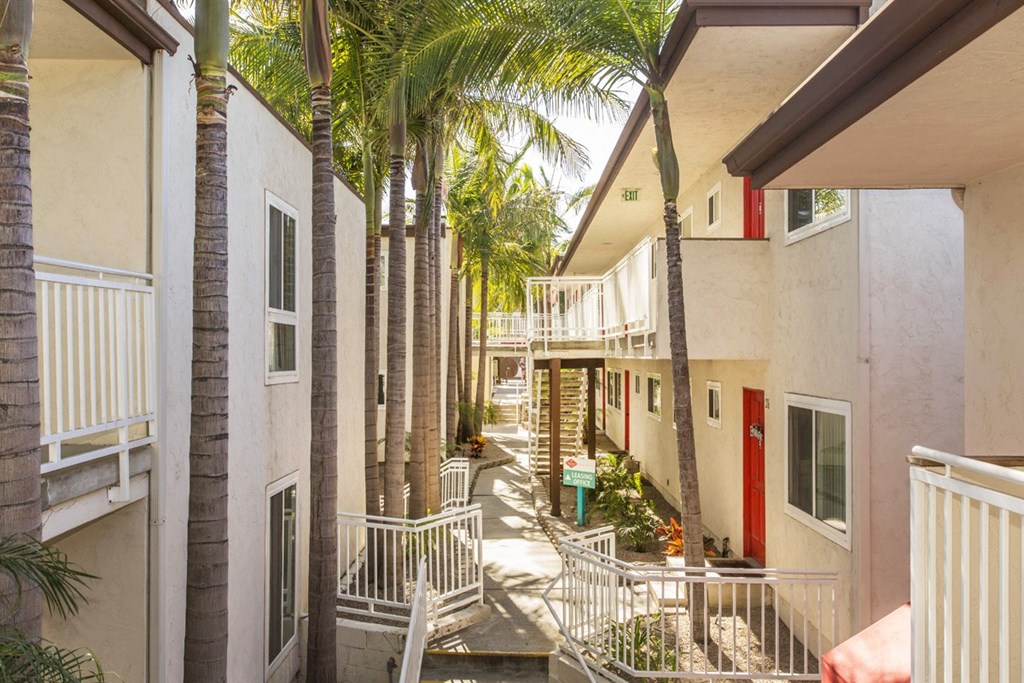 Pacific Sands walkway with tropical landscaping at Pacific Sands, San Diego, CA, 92117