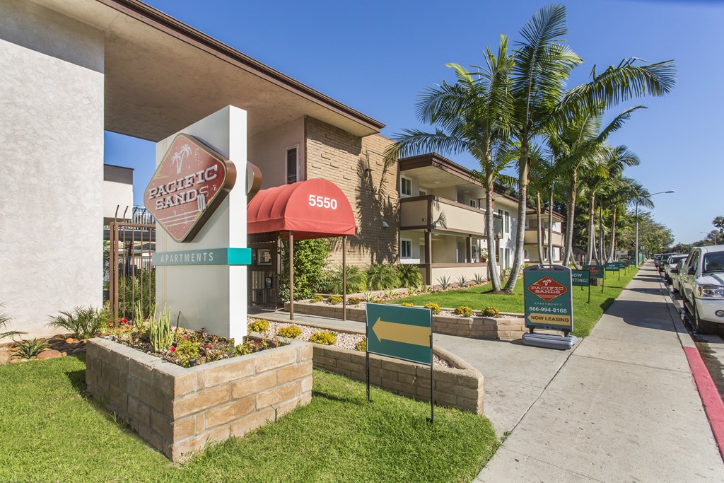 Pacific Sands entrance with tropical landscaping at Pacific Sands, San Diego, CA, 92117