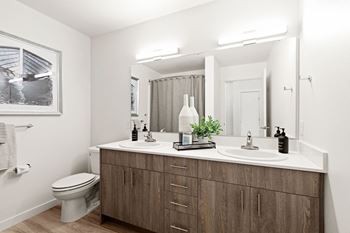 Bathroom with large vanity and double sinks, at The Duo, Washington