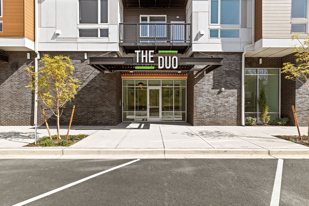front of the duo with sidewalk and parking lot at The Duo, Washington