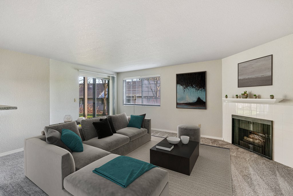 Carpeted living room with gas fireplace and mantle, with sliding glass doors to outside, and window with blinds.at Capitol Crossing, Olympia
