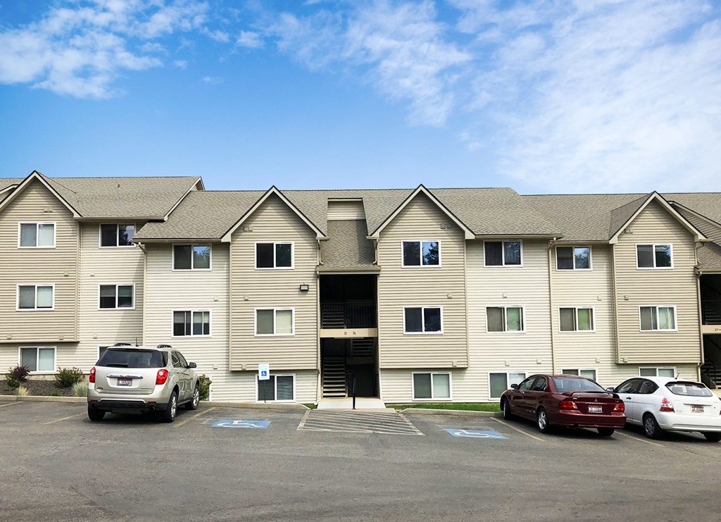 Community Exterior Clearwater Apartments exterior shot with community parking in front.at Clearwater, Post Falls, ID 83854