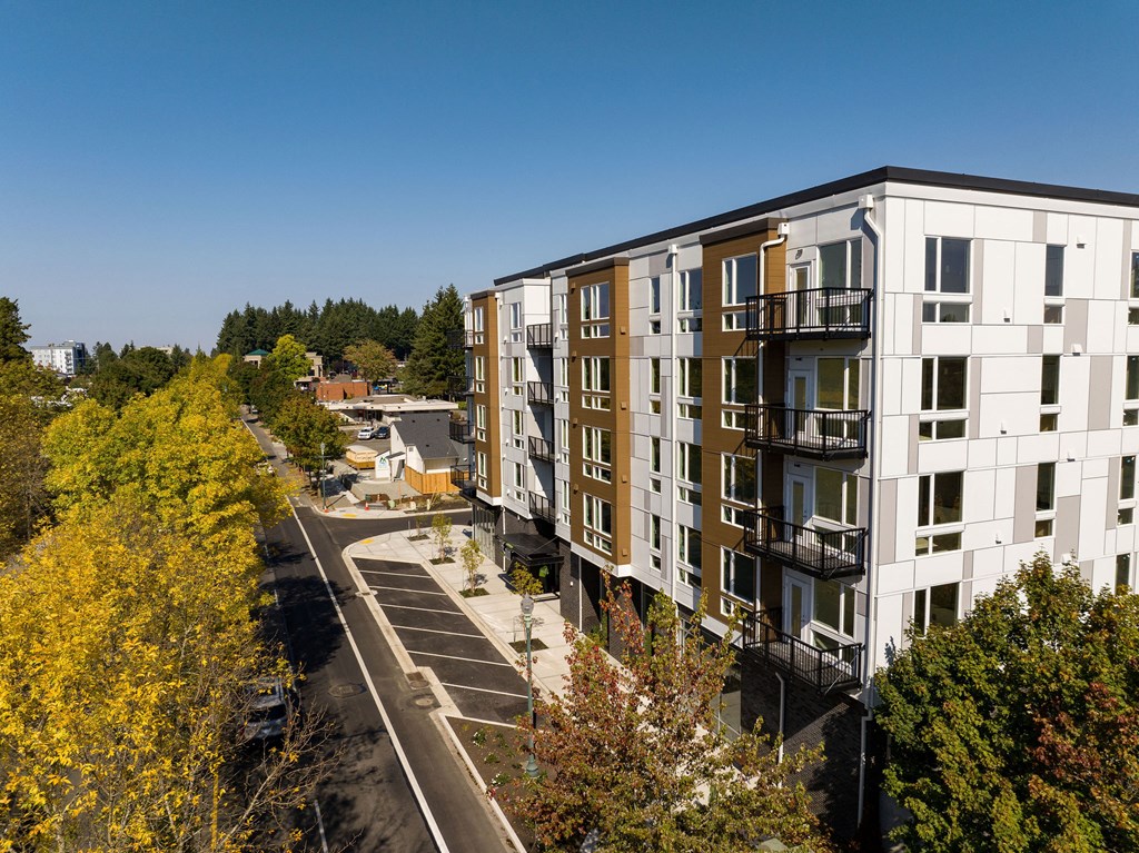 an aerial view of an apartment building on a city street at The Duo, University Place, 98466