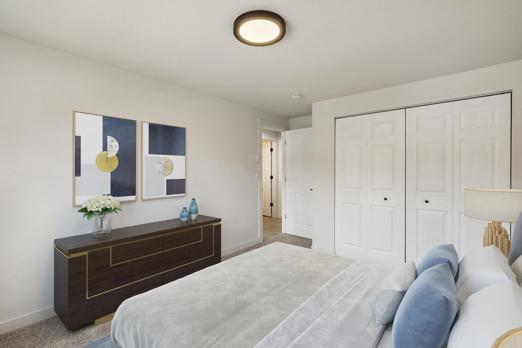 a bedroom with white walls and a large white bed  at Brix, Washington, 99362