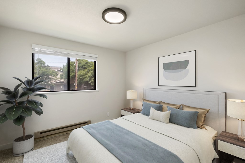 a bedroom with a large bed and a large window  at Brix, Walla Walla