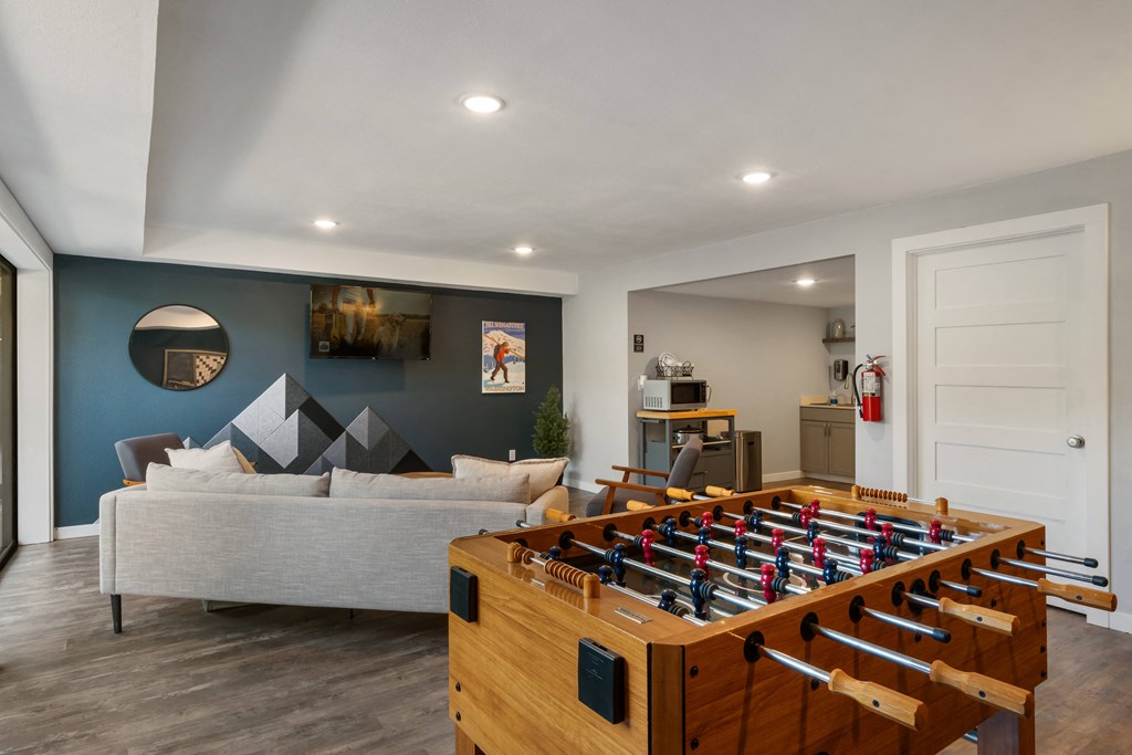 Room with foosball table and a couch at Castlerock, Wenatchee, WA 98801