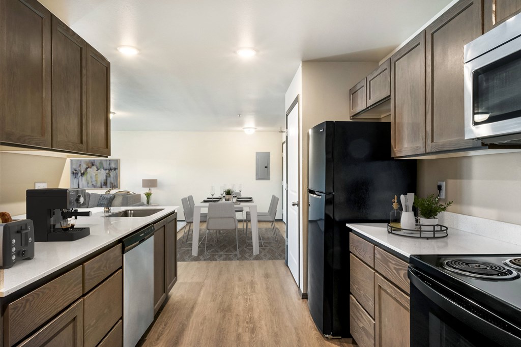 a kitchen and dining area in a 555 waverly unit  at Altitude, East Wenatchee, Washington