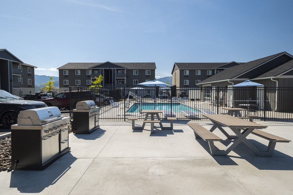 take a dip in the pool at the whispering winds apartments in pearland, tx  at Altitude, Washington, 98802