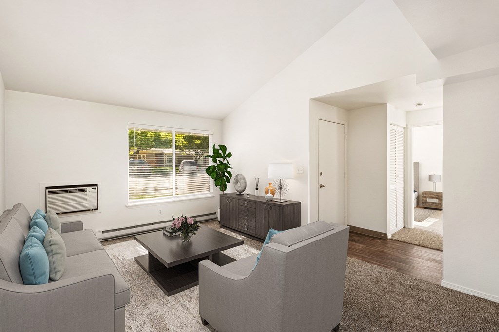a living room with two couches and a coffee table at Park View Apartments, Wenatchee, 98801