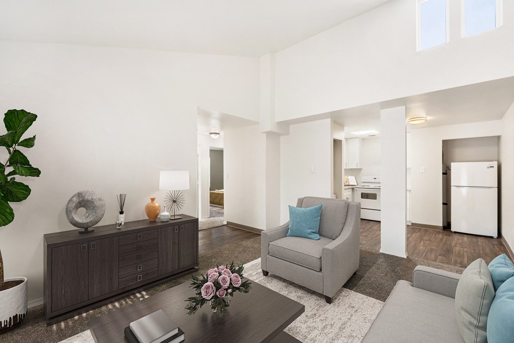 a living room with two couches and a coffee table at Park View Apartments, Wenatchee Washington