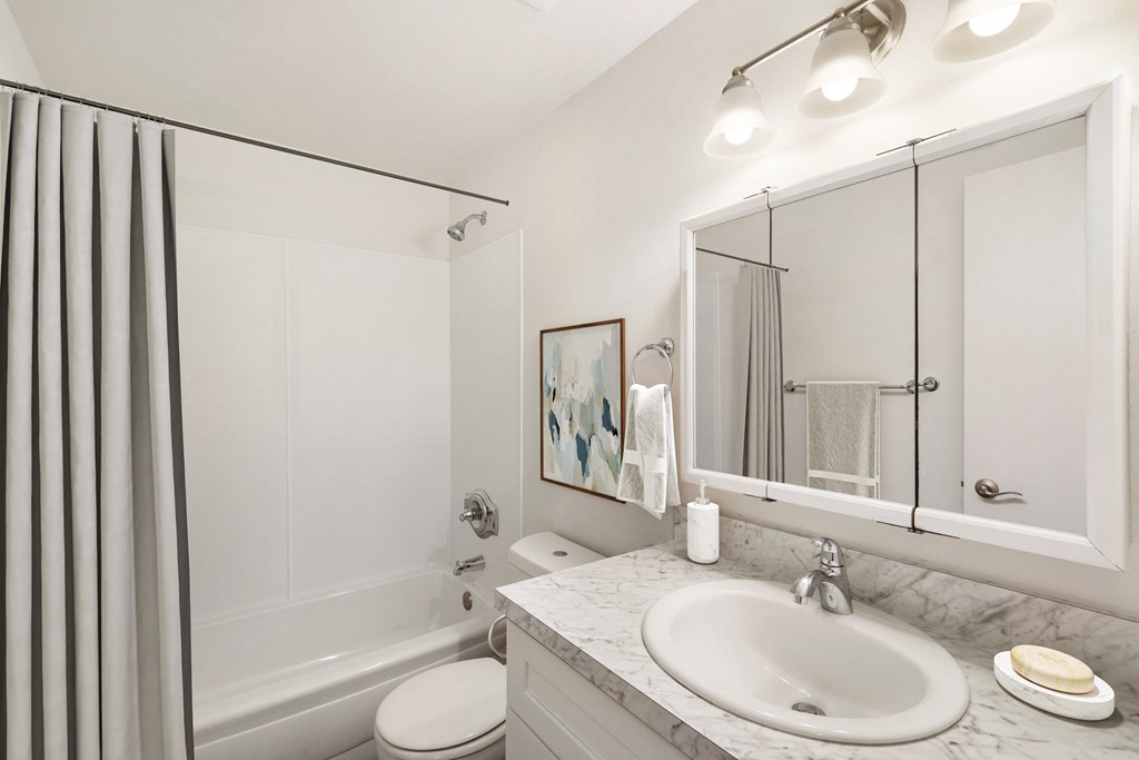 a bathroom with a bathtub and a sink at Park View Apartments, Washington, 98801