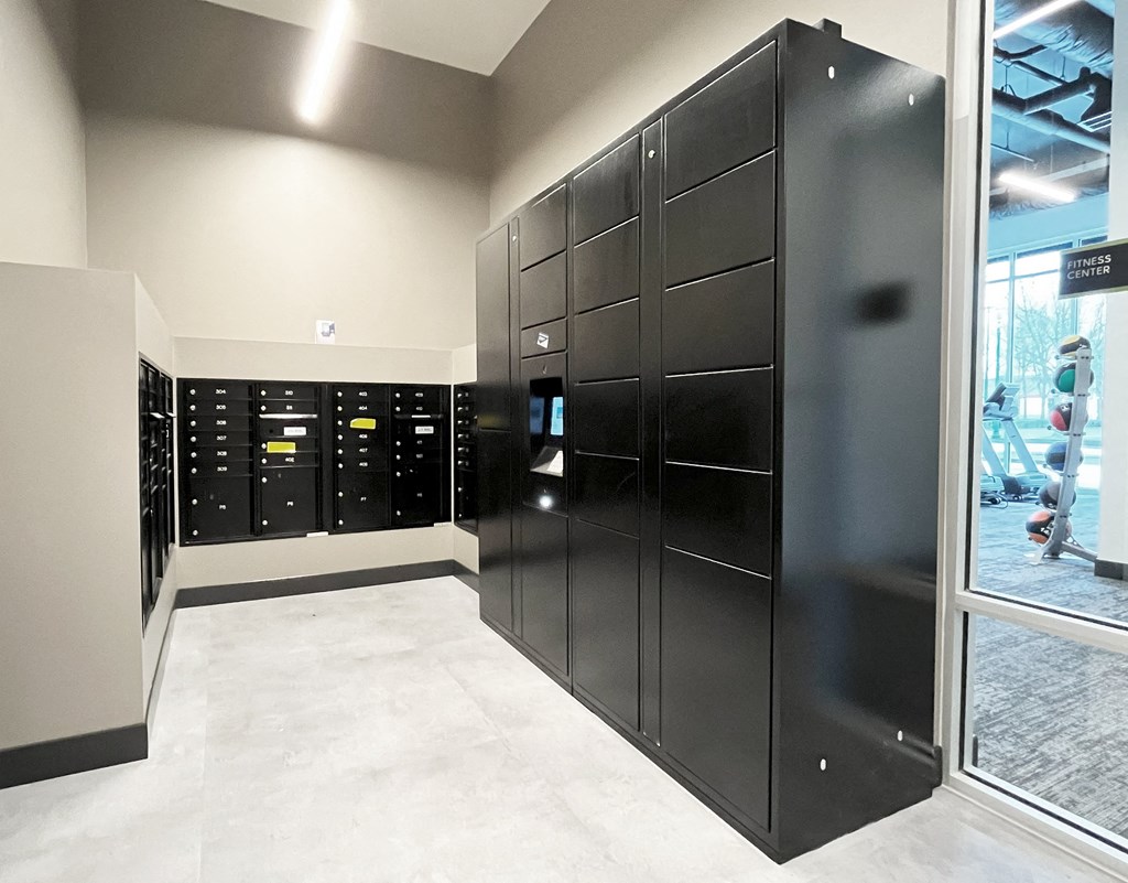 a bunch of lockers in a room with a window at The Duo, University Place, WA 